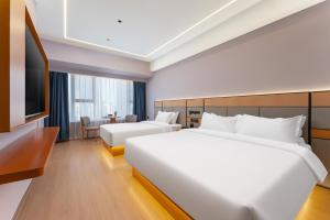 Fotografie z fotogalerie ubytování 沃德Smart酒店济南东站店 v destinaci Ťi-nan