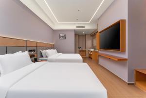 Fotografie z fotogalerie ubytování 沃德Smart酒店济南东站店 v destinaci Ťi-nan