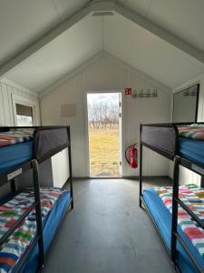 Arhus Cottage and Camping客房内的一张或多张床位