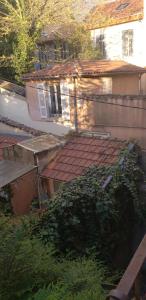 an outside view of a house with a roof at amazing view appartment in Lyon +1 photo