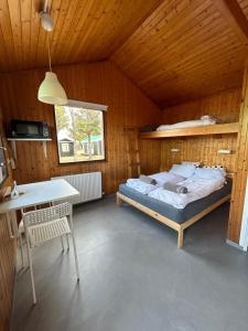 Arhus Cottage and Camping客房内的一张或多张床位