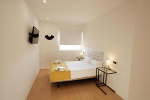 Posteľ alebo postele v izbe v ubytovaní Rental Room Valladolid