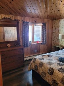 Postel nebo postele na pokoji v ubytování Chalet "Ici et maintenant, sur le lac"