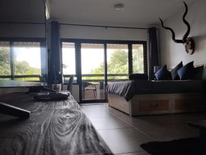 Et opholdsområde på African surf explosion! tasteful upmarket unit