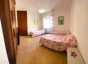 Katil atau katil-katil dalam bilik di Domus Mare Amalfi Coast