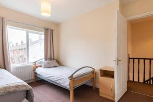 Postel nebo postele na pokoji v ubytování Home stay in Kimmage