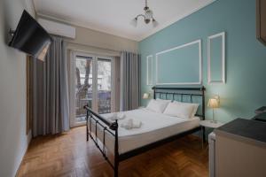 Posteľ alebo postele v izbe v ubytovaní Victoria Boutique Studios