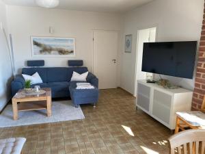 TV a/nebo společenská místnost v ubytování Ferienwohnung Meyer
