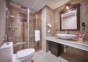 Ένα μπάνιο στο Ziva Suites - A Botique Hotel
