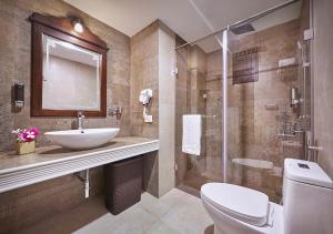 Ένα μπάνιο στο Ziva Suites - A Botique Hotel