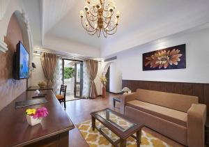 Μια τηλεόραση ή/και κέντρο ψυχαγωγίας στο Ziva Suites - A Botique Hotel