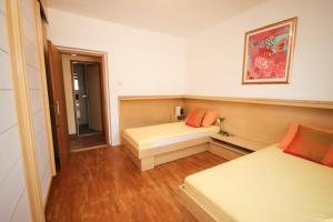 Ein Bett oder Betten in einem Zimmer der Unterkunft Apartment Macan