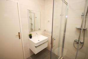 Ein Badezimmer in der Unterkunft Apartment Macan
