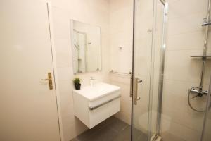 Ein Badezimmer in der Unterkunft Apartment Macan