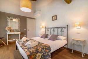 Postel nebo postele na pokoji v ubytování Casa dei Fiori