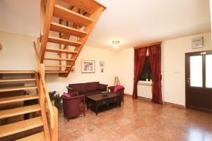 Ein Sitzbereich in der Unterkunft Apartment Macan