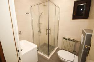 Ein Badezimmer in der Unterkunft Apartment Macan