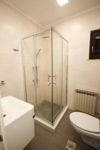 Ein Badezimmer in der Unterkunft Apartment Macan
