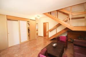 Ein Sitzbereich in der Unterkunft Apartment Macan