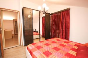Ein Bett oder Betten in einem Zimmer der Unterkunft Apartment Macan