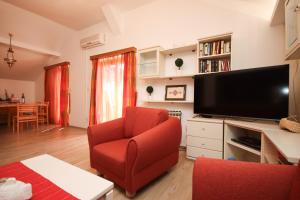 TV/Unterhaltungsangebot in der Unterkunft Apartment Macan