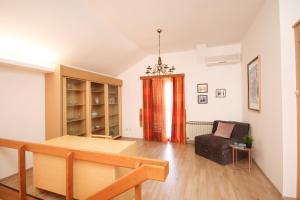 Ein Sitzbereich in der Unterkunft Apartment Macan