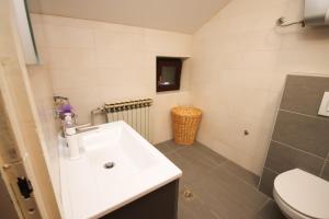 Ein Badezimmer in der Unterkunft Apartment Macan