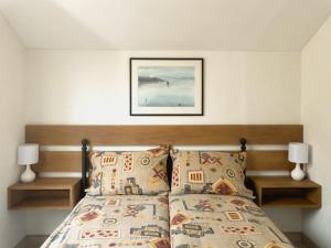 Postel nebo postele na pokoji v ubytování Apartmani AquaMarine