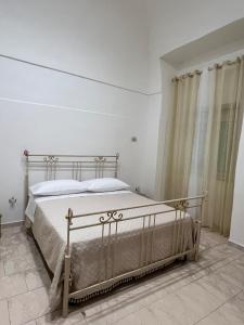 Ένα ή περισσότερα κρεβάτια σε δωμάτιο στο La casa di Anna +13 φωτογραφίες