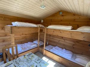 Postel nebo postele na pokoji v ubytování Krogager Primitiv Camping - Krogen