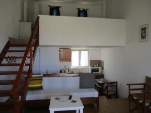 A kitchen or kitchenette at Theodosia Studios
