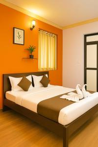 Postelja oz. postelje v sobi nastanitve Ora Classic " Budget Stay Near to Calangute Beach " Free WiFi