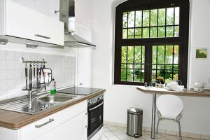 Η κουζίνα ή μικρή κουζίνα στο Ferienwohnung im Musikerviertel +10 φωτογραφίες