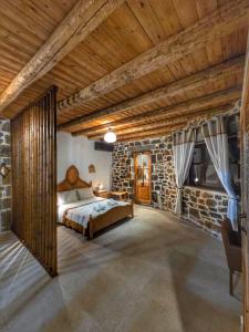 Postel nebo postele na pokoji v ubytování Balsamico Traditional Suites + 18 fotografií