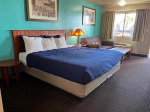 Letto o letti in una camera di Claridge Inn - St. George