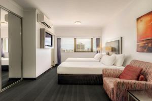 Postel nebo postele na pokoji v ubytování Courtyard by Marriott Darwin