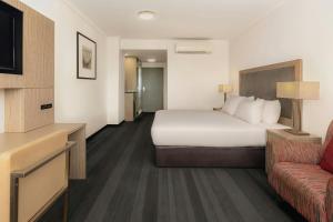 Postel nebo postele na pokoji v ubytování Courtyard by Marriott Darwin