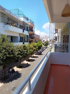 a view of a street from the balcony of a building at Sol Colonial in Santo Domingo +18 photos