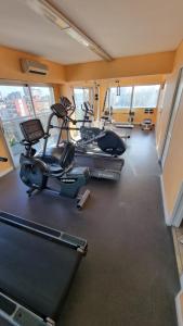 a gym with several exercise bikes in a room at Muy Hermoso Departamento en Recoleta in Buenos Aires