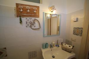 Koupelna v ubytování B&B Polifemo Etna + 37 fotografií