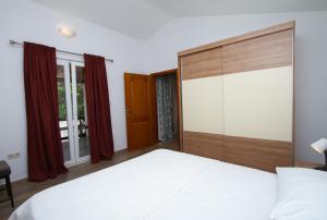 Postel nebo postele na pokoji v ubytování Apartman Francesca