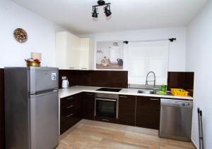 Kuchyň nebo kuchyňský kout v ubytování Apartman Francesca