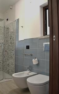 Koupelna v ubytování Zenia Rooms
