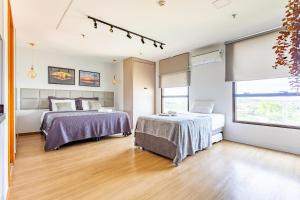 En eller flere senge i et værelse på Apartamento no Comfort hotel Taguatinga + 243 billeder