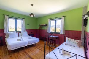 Postel nebo postele na pokoji v ubytování Basarte Cottage