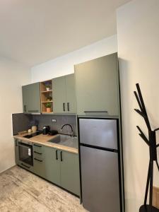 Dapur atau dapur kecil di Inos Apartment +3 gambar