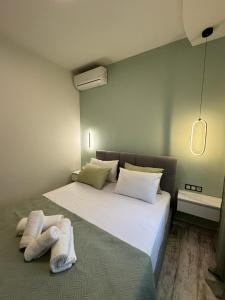 Katil atau katil-katil dalam bilik di Inos Apartment
