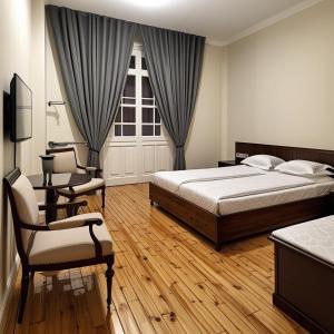 Postel nebo postele na pokoji v ubytování havana hotel