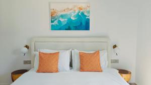 Postel nebo postele na pokoji v ubytování VILLA MARGARIT Boutique Hotel
