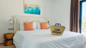 Postel nebo postele na pokoji v ubytování VILLA MARGARIT Boutique Hotel